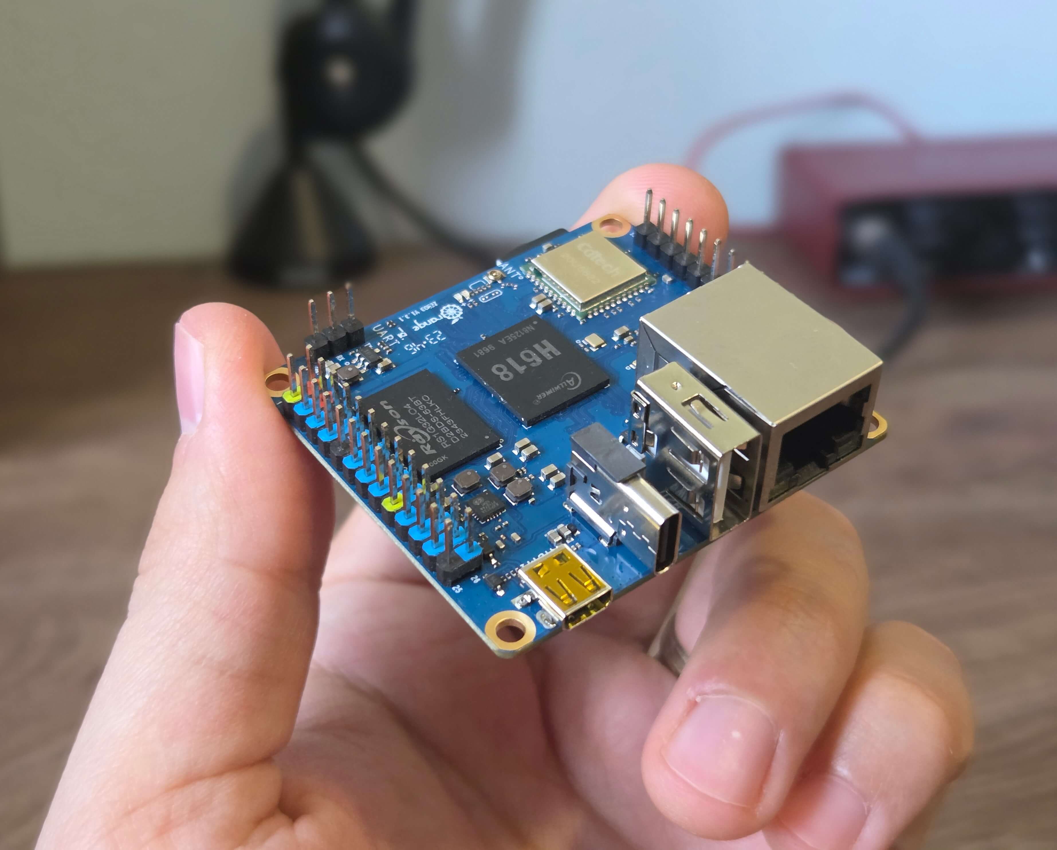 Image showing Orange Pi Zero 3 held in a hand